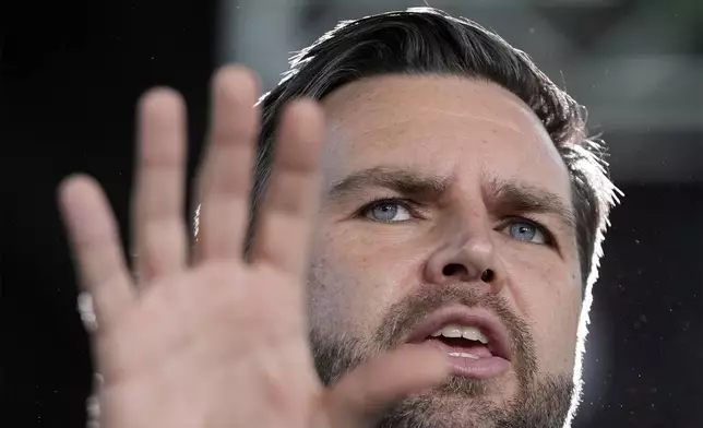 Republican vice presidential nominee Sen. JD Vance, R-Ohio speaks at a campaign event at Eastern Market Tuesday, Oct. 8, 2024, in Detroit. (AP Photo/Paul Sancya)