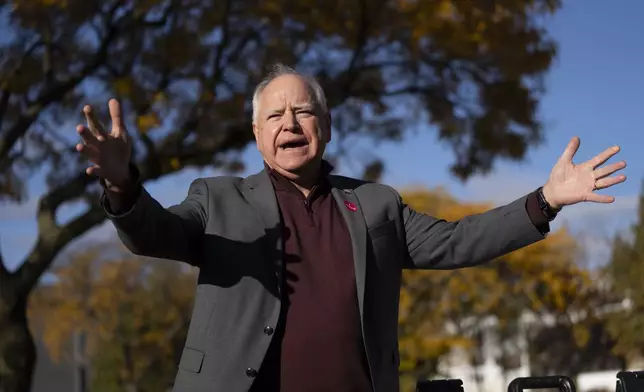 Minnesota Governor and Vice Presidential candidate Tim Walz speaks to the press after voting early at Ramsey County Elections in St. Paul, Minn., on Wednesday, October 23, 2024. (Renée Jones Schneider/Star Tribune via AP)