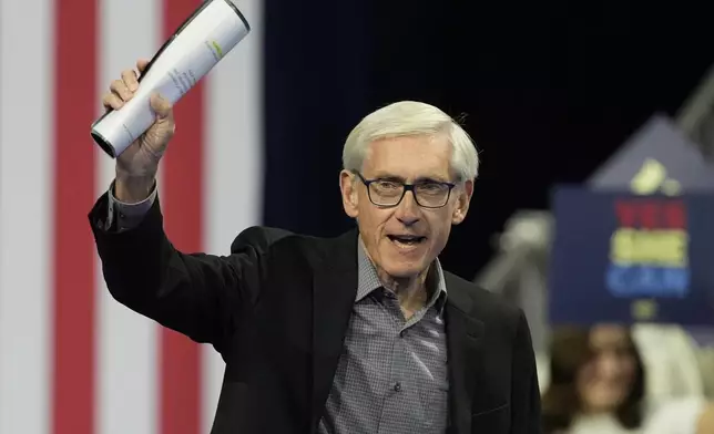 Wisconsin Gov. Tony Evers arrives to speak at a campaign event before Democratic vice presidential nominee Minnesota Gov. Tim Walz and former President Barack Obama, Tuesday, Oct. 22, 2024, in Madison, Wis. (AP Photo/Morry Gash)