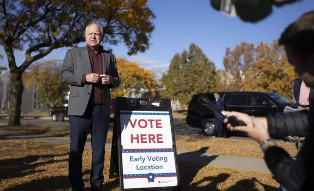 Minnesota Governor and Vice Presidential candidate Tim Walz speaks to the press after early voting at Ramsey County Elections in St. Paul, Minn., on Wednesday, October 23, 2024. (Renée Jones Schneider/Star Tribune via AP)