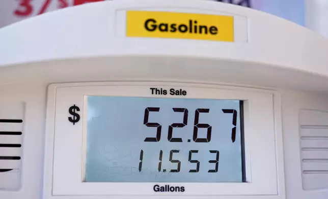 A cost total is displayed on a screen at a Shell gas station, Wednesday, Oct. 9, 2024, in Seattle. (AP Photo/Lindsey Wasson)