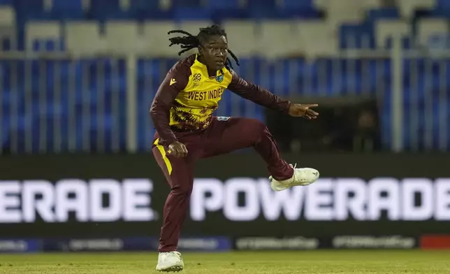 West Indies' Deandra Dottin bowls a delivery during the ICC Women's T20 World Cup 2024 semi-final match between New Zealand and West Indies at Sharjah Stadium, United Arab Emirates, Friday, Oct. 18, 2024. (AP Photo/Altaf Qadri)