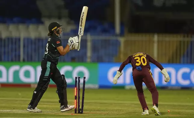 New Zealand's Suzie Bates reacts after getting bowled out during the ICC Women's T20 World Cup 2024 semi-final match between New Zealand and West Indies at Sharjah Stadium, United Arab Emirates, Friday, Oct. 18, 2024. (AP Photo/Altaf Qadri)