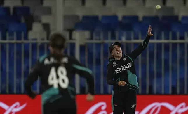 New Zealand's Fran Jonas celebrates after taking a catch to dismiss West Indies' Deandra Dottin during the ICC Women's T20 World Cup 2024 semi-final match between New Zealand and West Indies at Sharjah Stadium, United Arab Emirates, Friday, Oct. 18, 2024. (AP Photo/Altaf Qadri)