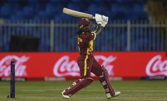 West Indies' Deandra Dottin plays a shot during the ICC Women's T20 World Cup 2024 semi-final match between New Zealand and West Indies at Sharjah Stadium, United Arab Emirates, Friday, Oct. 18, 2024. (AP Photo/Altaf Qadri)