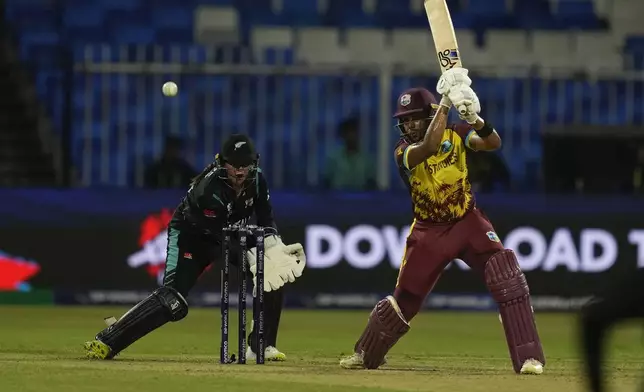 West Indies' captain Hayley Matthews plays a shot during the ICC Women's T20 World Cup 2024 semi-final match between New Zealand and West Indies at Sharjah Stadium, United Arab Emirates, Friday, Oct. 18, 2024. (AP Photo/Altaf Qadri)