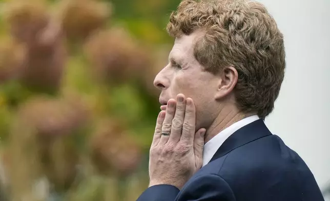 Joseph Kennedy III, grandson of Ethel Kennedy, pauses on the steps of Our Lady of Victory church following funeral services for Ethel Kennedy, Monday, Oct. 14, 2024, in Centerville, Mass. (AP Photo/Steven Senne)