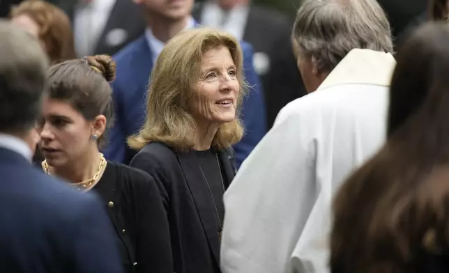 Caroline Kennedy, center, daughter of Pres. John F. Kennedy, speaks with people as she departs Our Lady of Victory church following funeral services for Ethel Kennedy, wife of Sen. Robert F. Kennedy, Monday, Oct. 14, 2024, in Centerville, Mass. (AP Photo/Steven Senne)