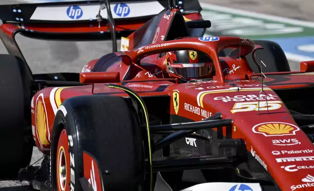 Ferrari driver Carlos Sainz, of Spain, exits pit row during the F1 U.S. Grand Prix auto race at the Circuit of the Americas, Sunday, Oct. 20, 2024, in Austin, Texas. (Patrick Fallon/Pool Photo via AP)