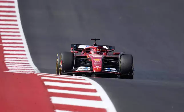 Ferrari driver Charles Leclerc, of Monaco, heads into Turn 1 during the U.S. Grand Prix auto race at Circuit of the Americas, Sunday, Oct. 20, 2024, in Austin, Texas. (AP Photo/Eric Gay)