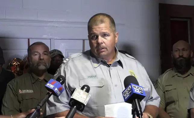 Georgia Department of Natural Resources, Captain Chris Hodge speaks during a news conference after a gangway collapse on Sapelo Island, Ga in McIntosh county, Sunday, Oct. 20, 2024. (AP Photo/Lewis M. Levine)