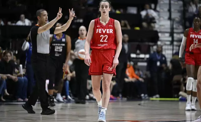 Indiana Fever guard Caitlin Clark (22) receives a delay of game warning during the second half of Game 2 of a first-round WNBA basketball playoff series agains the Connecticut Sun, Wednesday, Sept. 25, 2024, in Uncasville, Conn. (AP Photo/Jessica Hill)