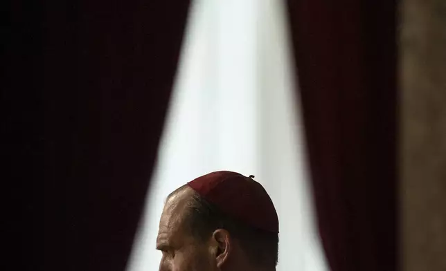 This image released by Focus Features shows Ralph Fiennes in a scene from "Conclave." (Philippe Antonello/Focus Features via AP)