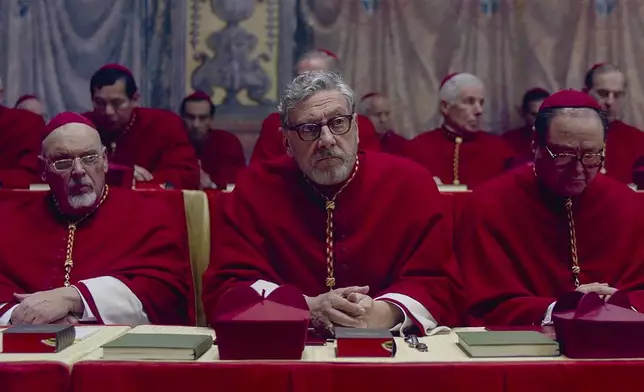 This image released by Focus Features shows Sergio Castellitto, center, in a scene from "Conclave." (Focus Features via AP)