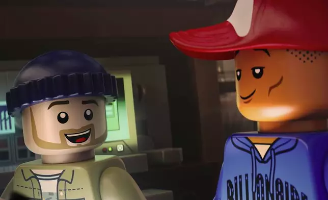 This image released by Focus Features shows lego characters voiced by Justin Timberlake, left, and Pharrell Williams in a scene from "Piece By Piece." (Focus Features via AP)