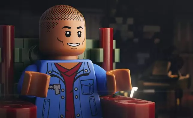 This image released by Focus Features shows a lego character voiced by Pharrell Williams in a scene from "Piece By Piece." (Focus Features via AP)