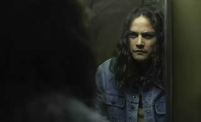 This image released by Netflix shows Daniel Zovatto in a scene from "Woman of the Hour." (Leah Gallo/Netflix via AP)