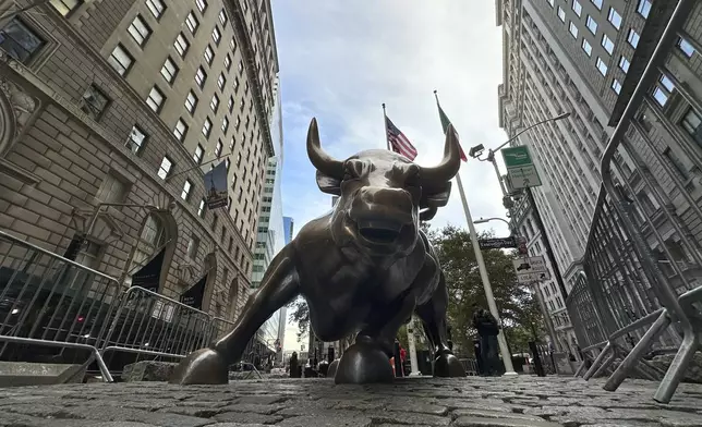 The Charging Bull statue in New York's Financial District is shown on Tuesday, Oct. 15, 2024. (AP Photo/Peter Morgan)