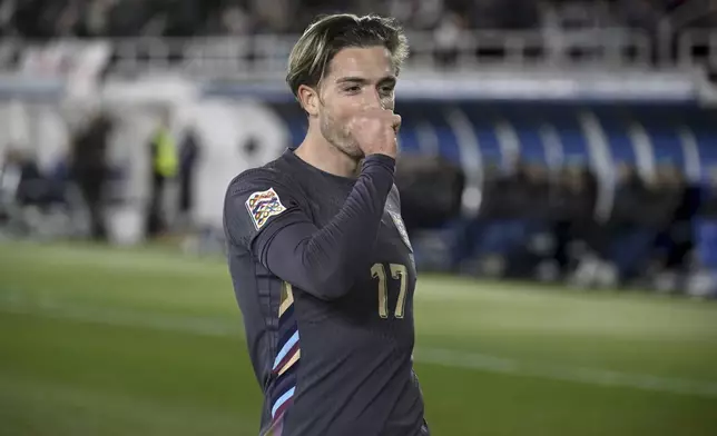 Jack Grealish of England celebrates after scoring the opening goal during the UEFA Nations League soccer match between Finland and England, at the Olympic Stadium in Helsinki, Finland, Sunday, Oct. 13, 2024. (Antti Aimo-Koivisto/Lehtikuva via AP)