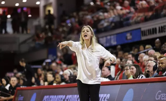 FILE - Tennessee head coach Kellie Harper shouts to her team during a second-round college basketball game against North Carolina State in the NCAA Tournament in Raleigh, N.C., Monday, March 25, 2024. (AP Photo/Ben McKeown,File)