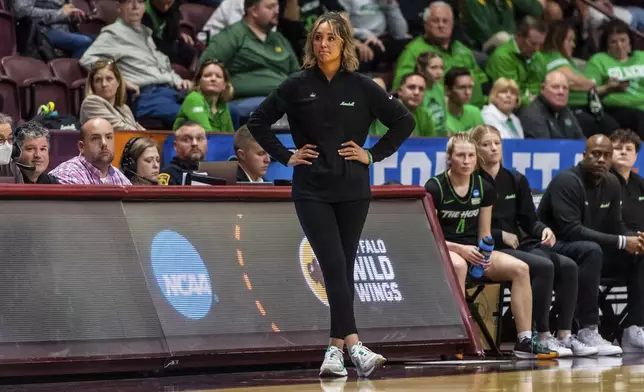 FILE - Marshall head coach Kim Caldwell looks on during the second half of a first-round college basketball game against Virginia Tech in the women's NCAA Tournament in Blacksburg, Va., Friday, March 22, 2024. (AP Photo/Robert Simmons, File)