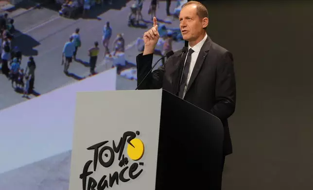 Tour de France director Christian Prudhomme speaks during the 2025 Tour de France cycling race roadmap unveiling, Tuesday, Oct. 29, 2024 in Paris. (AP Photo/Michel Euler)