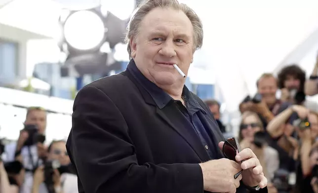 Actor Gerard Depardieu poses for photographers during a photo call for the film Valley of Love, at the 68th international film festival, Cannes, southern France, on May 22, 2015. (AP Photo/Thibault Camus, File)