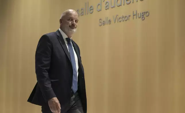 Bodyguard of French far-right leader Marine Le Pen Thierry Legier arrives at the court house in Paris, Monday, Sept. 30, 2024. (AP Photo/Thibault Camus)