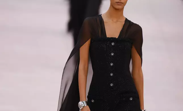 A model wears a creation as part of the Chanel Spring/Summer 2025 collection presented Tuesday, Oct. 1, 2024, in Paris. (Photo by Vianney Le Caer/Invision/AP)