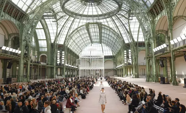 Models wear creations as part of the Chanel Spring/Summer 2025 collection presented Tuesday, Oct. 1, 2024, in Paris. (Photo by Vianney Le Caer/Invision/AP)