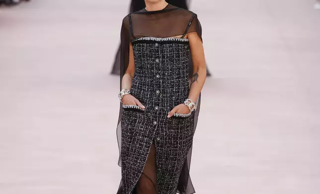 A model wears a creation as part of the Chanel Spring/Summer 2025 collection presented Tuesday, Oct. 1, 2024, in Paris. (Photo by Vianney Le Caer/Invision/AP)