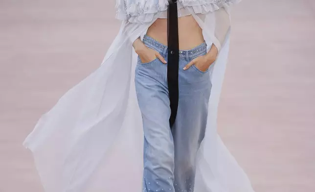 A model wears a creation as part of the Chanel Spring/Summer 2025 collection presented Tuesday, Oct. 1, 2024, in Paris. (Photo by Vianney Le Caer/Invision/AP)