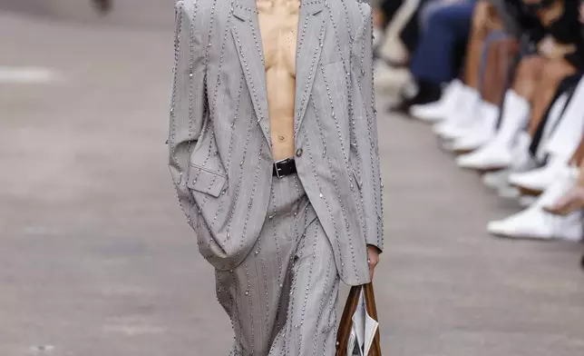 A model wears a creation as part of the Stella McCartney Spring/Summer 2025 collection presented Monday, Sept. 30, 2024 in Paris. (Photo by Vianney Le Caer/Invision/AP)