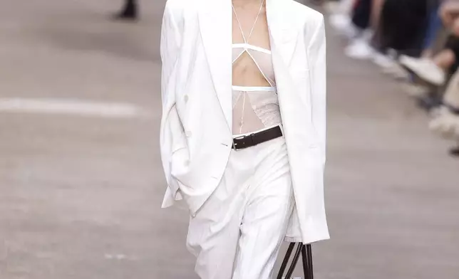 A model wears a creation as part of the Stella McCartney Spring/Summer 2025 collection presented Monday, Sept. 30, 2024 in Paris. (Photo by Vianney Le Caer/Invision/AP)