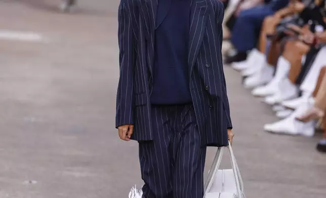 A model wears a creation as part of the Stella McCartney Spring/Summer 2025 collection presented Monday, Sept. 30, 2024 in Paris. (Photo by Vianney Le Caer/Invision/AP)