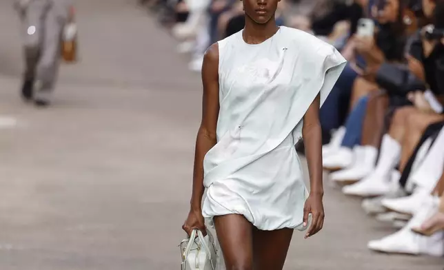 A model wears a creation as part of the Stella McCartney Spring/Summer 2025 collection presented Monday, Sept. 30, 2024 in Paris. (Photo by Vianney Le Caer/Invision/AP)