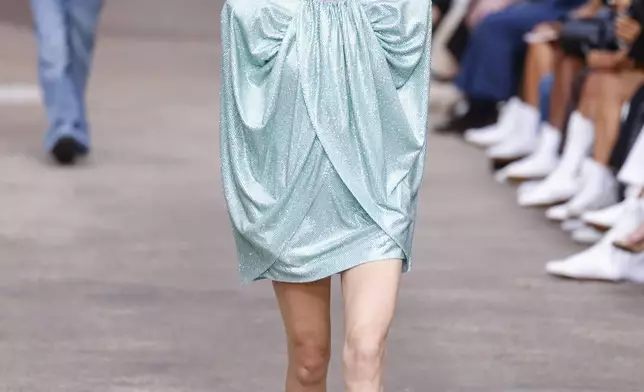 A model wears a creation as part of the Stella McCartney Spring/Summer 2025 collection presented Monday, Sept. 30, 2024 in Paris. (Photo by Vianney Le Caer/Invision/AP)