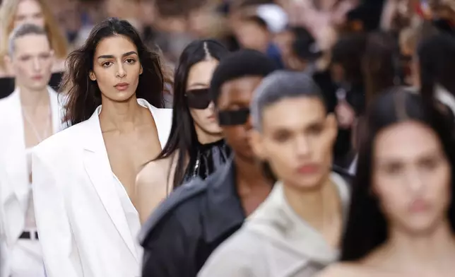 Models wear creations as part of the Stella McCartney Spring/Summer 2025 collection presented Monday, Sept. 30, 2024 in Paris. (Photo by Vianney Le Caer/Invision/AP)