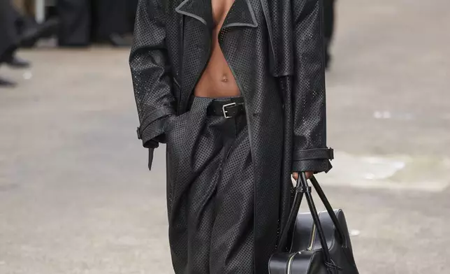 A model wears a creation as part of the Stella McCartney Spring/Summer 2025 collection presented Monday, Sept. 30, 2024 in Paris. (Photo by Scott A Garfitt/Invision/AP)