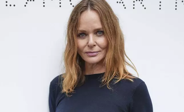 Stella McCartney poses for photographs after her Spring/Summer 2025 collection presented Monday, Sept. 30, 2024 in Paris. (Photo by Scott A Garfitt/Invision/AP)