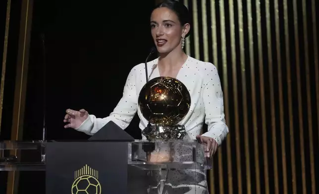 Barcelona's Aitana Bonmati delivers her speech as she receives the 2024 Women's Ballon d'Or award during the 68th Ballon d'Or (Golden Ball) award ceremony at Theatre du Chatelet in Paris, Monday, Oct. 28, 2024. (AP Photo/Michel Euler)