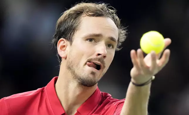 Russia's Daniil Medvedev rprepares to serves the ball to Alexei Popyrin, of Australia, during their second round match of the Paris Masters tennis tournament, Wednesday, Oct. 30, 2024 in Paris. (AP Photo/Michel Euler)