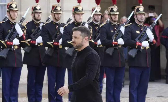 Ukrainian President Volodymyr Zelenskyy arrives for a meeting at the Elysee Palace, in Paris, Thursday, Oct. 10, 2024. (AP Photo/Michel Euler)