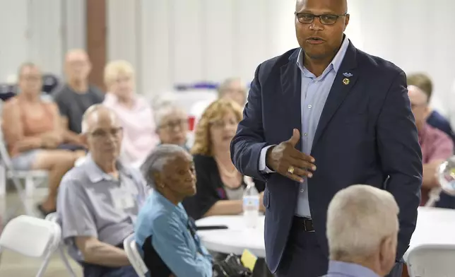 Democratic candidate Shawn Harris addresses supporters during a barbecue at the Chattanooga County Agricultural Center in Summerville, Ga. on Tuesday, Sept. 24, 2024. (Matt Hamilton/Chattanooga Times Free Press via AP)