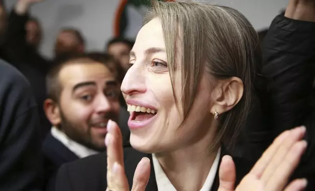 Nana Malashkhia, who leads the Coalition for Change parliament list, reacts at coalition's headquarters after polls closing at the parliamentary election in Tbilisi, Georgia, Saturday, Oct. 26, 2024. (AP Photo/Zurab Tsertsvadze)