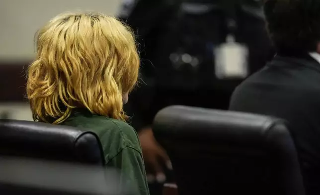 FILE - Colt Gray, charged as an adult with four counts of murder, sits in the Barrow County courthouse during his first appearance for the shooting at Apalachee High School, Sept. 6, 2024, in Winder, Ga. (AP Photo/Brynn Anderson, Pool, File)