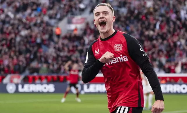 Leverkusen's Florian Wirtz celebrates scoring during the Bundesliga soccer match between Bayer Leverkusen and Eintracht Frankfurt at BayArena, Leverkusen, Germany, Saturday Oct. 19, 2024. (Marius Becker/dpa via AP)