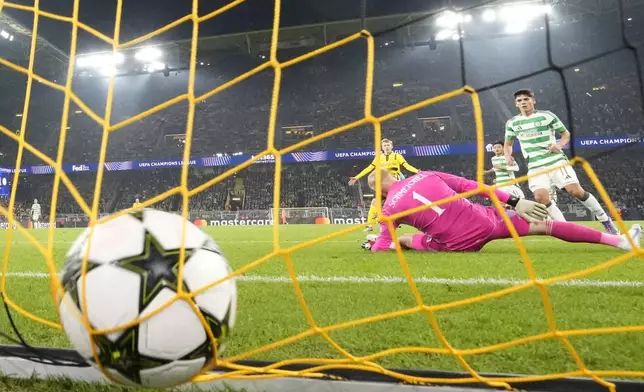 Celtic's goalkeeper Kasper Schmeichel receives the 6th goal by Dortmund's Serhou Guirassy during the Champions League opening phase soccer match between Borussia Dortmund and Celtic FC at the BVB Stadion in Dortmund, Tuesday, Oct. 1, 2024. (AP Photo/Martin Meissner)