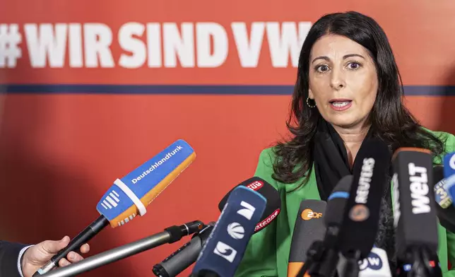 Daniela Cavallo, Chairwoman of the General and Group Works Council of Volkswagen AG, makes press statements before the start of the second collective bargaining negotiations between Volkswagen and IG Metall, in Wolfsburg, Germany, Wednesday, Oct. 30, 2024. (Moritz Frankenberg/dpa via AP)