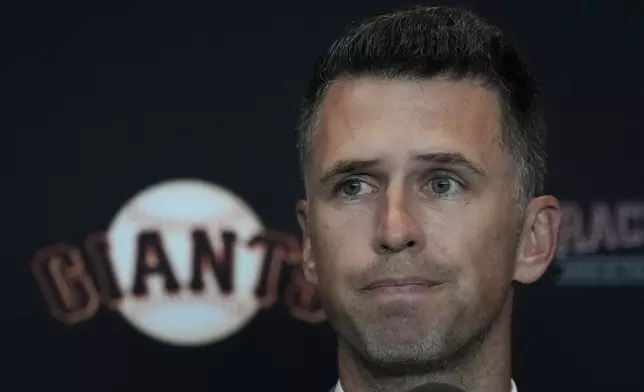 San Francisco Giants president of baseball operations Buster Posey speaks during a news conference in San Francisco, Tuesday, Oct. 1, 2024. (AP Photo/Jeff Chiu)